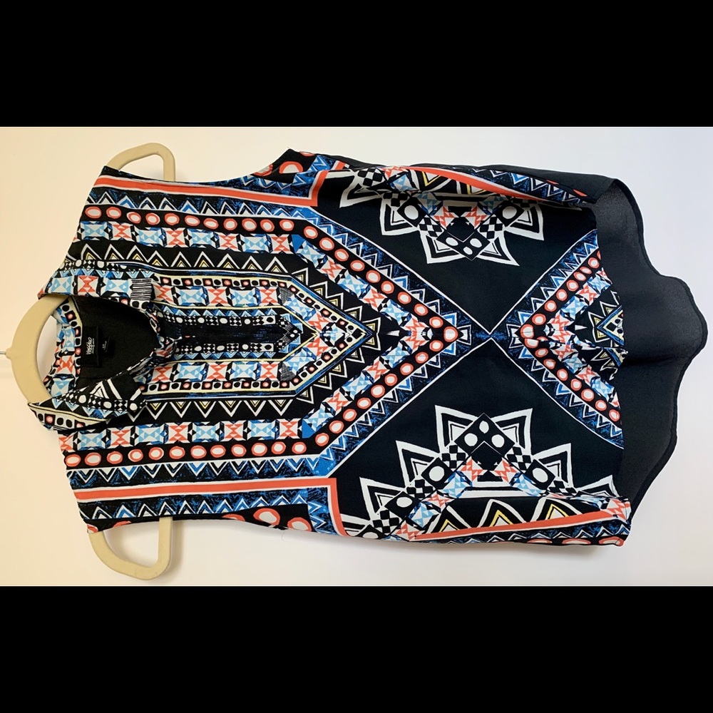 Patterned button up sleeveless blouse